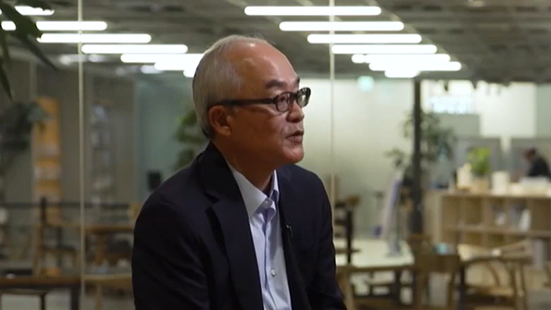 Hiroki Totoki, CEO of Sony, speaks during an interview in a modern office setting, discussing long-term capital strategy, private credit, and how diverse capital solutions support corporate transformation.